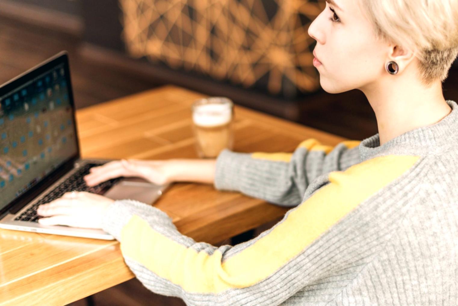 Instructor facilitating hands-on financial training session with business team